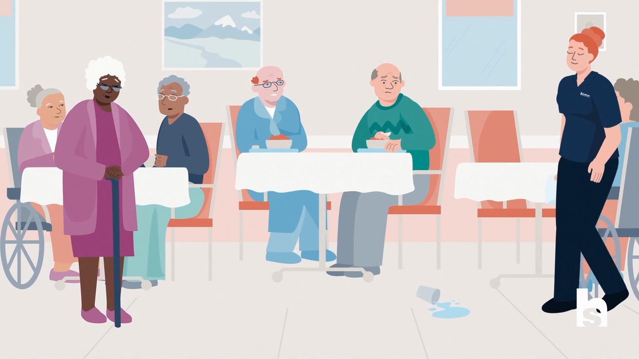 Animated care facility dining scene from an HCSG internal culture video — nurse passes a spilled cup near elderly residents
