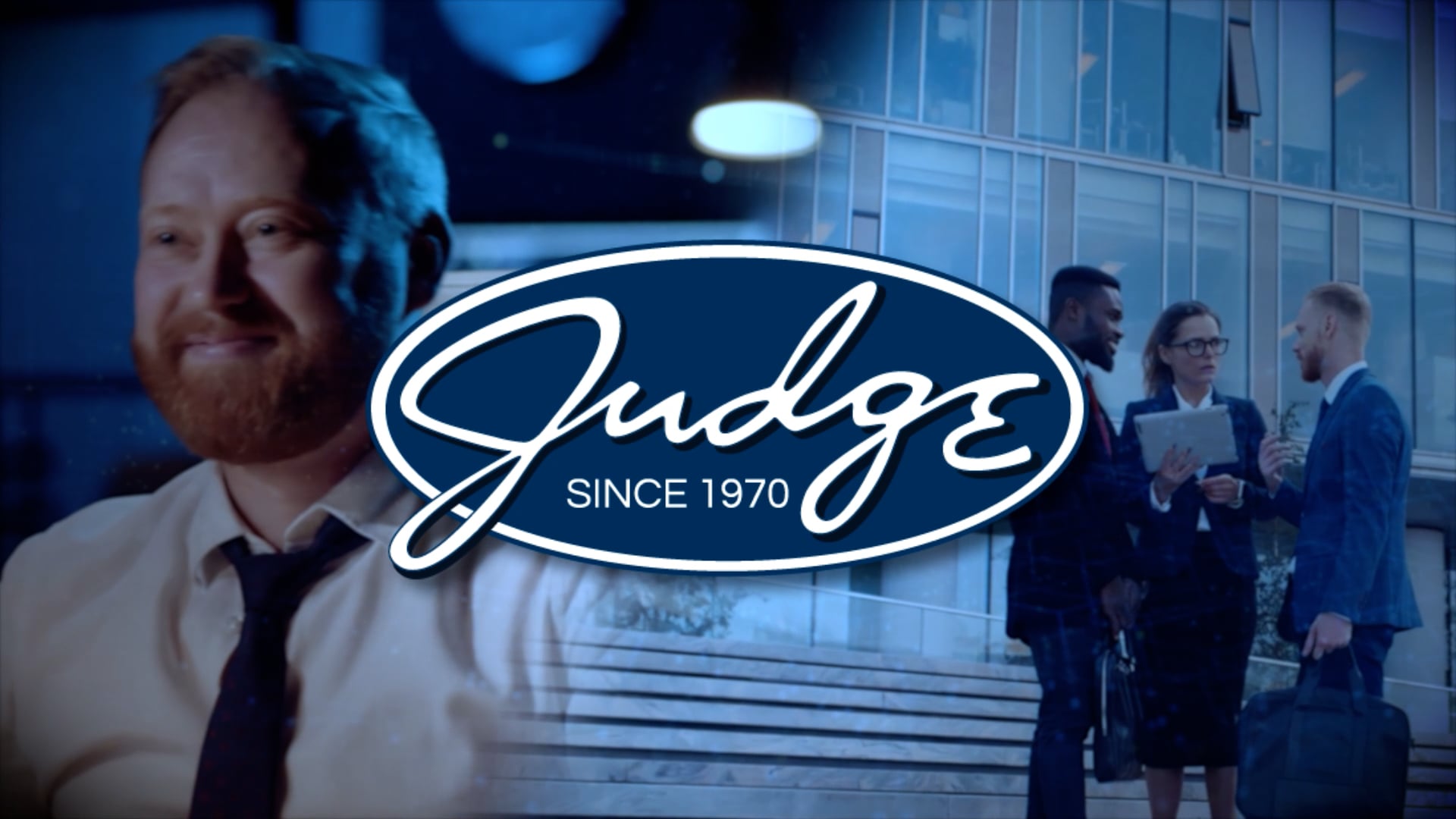 Judge Group government jobs recruiting video — smiling man in foreground, suited professionals consulting outside