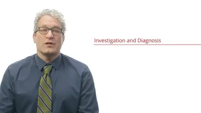 Presenter beside an animated kidney and bladder diagram labeled for an investigation and diagnosis lesson